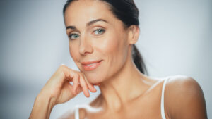 A person getting a skin treatment, Transform Your Skin with Radiofrequency Microneedling at Forbes Longevity Center