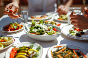 A group of people eating food, The Power of Nutrition for Longevity