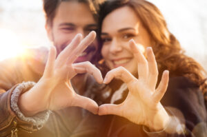 PRP Therapy for Longevity: Skin, Energy & Sexual Wellness, Two people making a hand heart