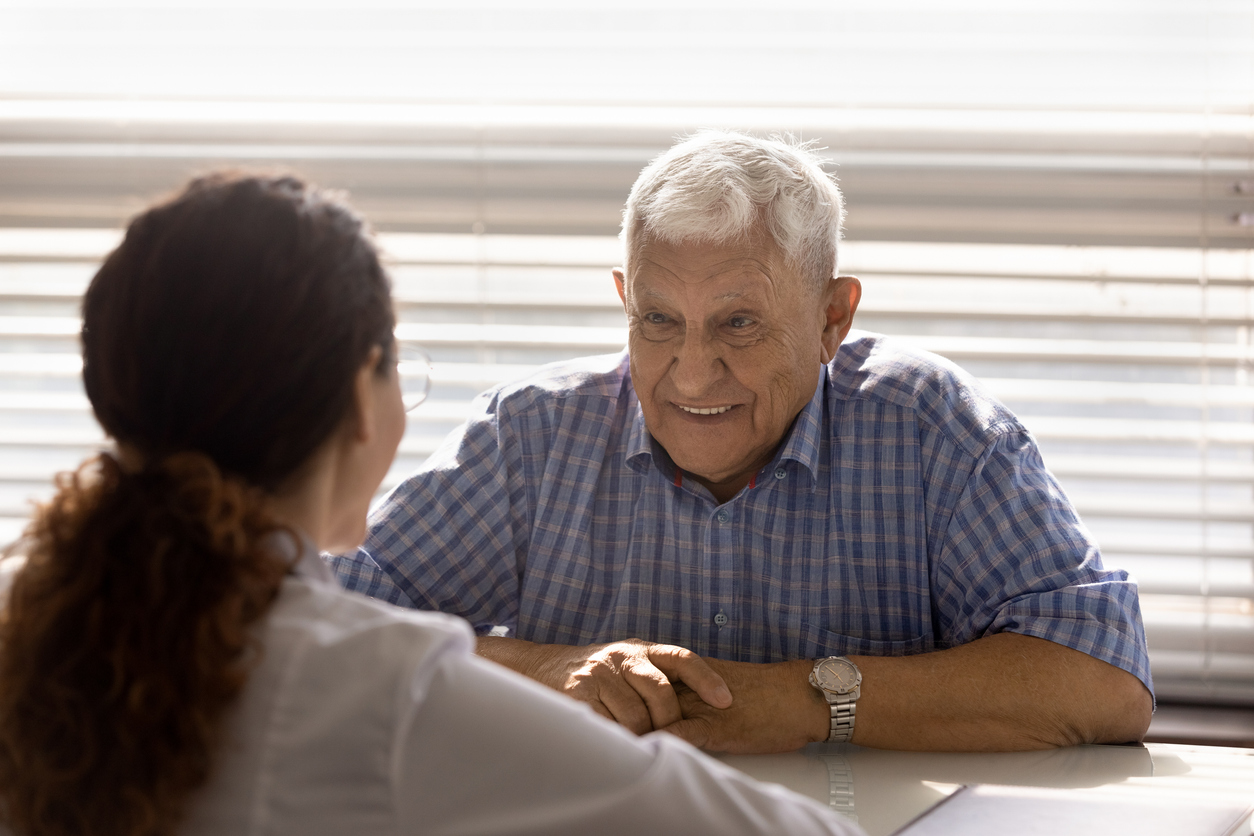 Patient discussing personalized hormone health and healthy aging strategies with a healthcare professional.